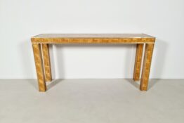 Woven rattan console table with brass