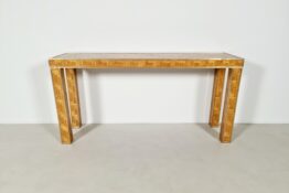 Woven rattan console table with brass Woven rattan console table with brass